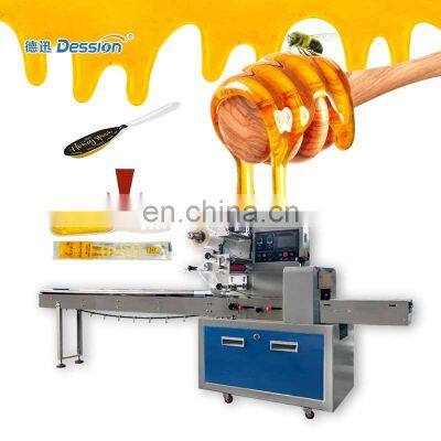 Automatic honey spoon packing machine