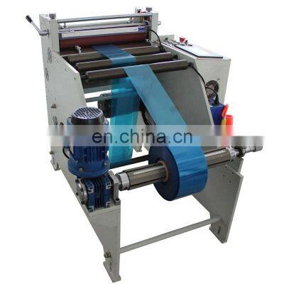 Plastic film roll to sheet cutting machine sheet cutter