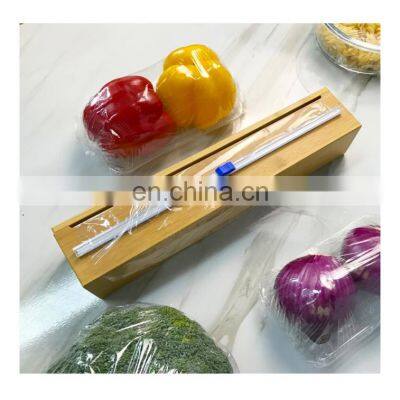 Single bamboo magnetic plastic wrap dispenser with slide cutter cling wrap dispenser