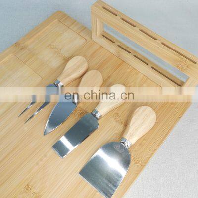 Amazon Hot Selling Custom Wooden Bamboo Cheese Board Set with Cutlery In Slide Out Drawer Cheese Platter Cutting Board